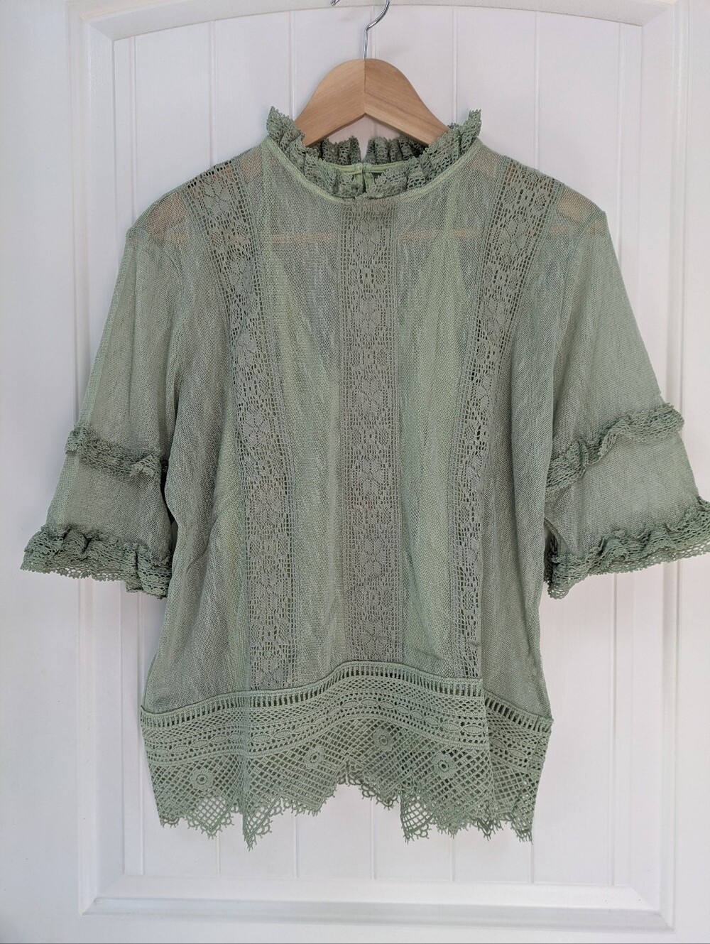 Anthropologie's NWOT Blue Tassel Celadon Lace  Top
